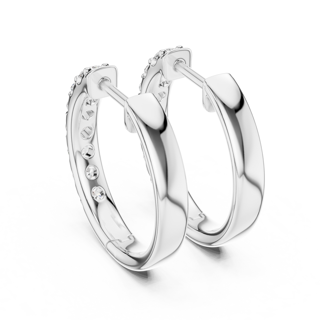 Roy Diamond white gold huggie hoop earrings back angle showing smooth inner curve and hinge lock design