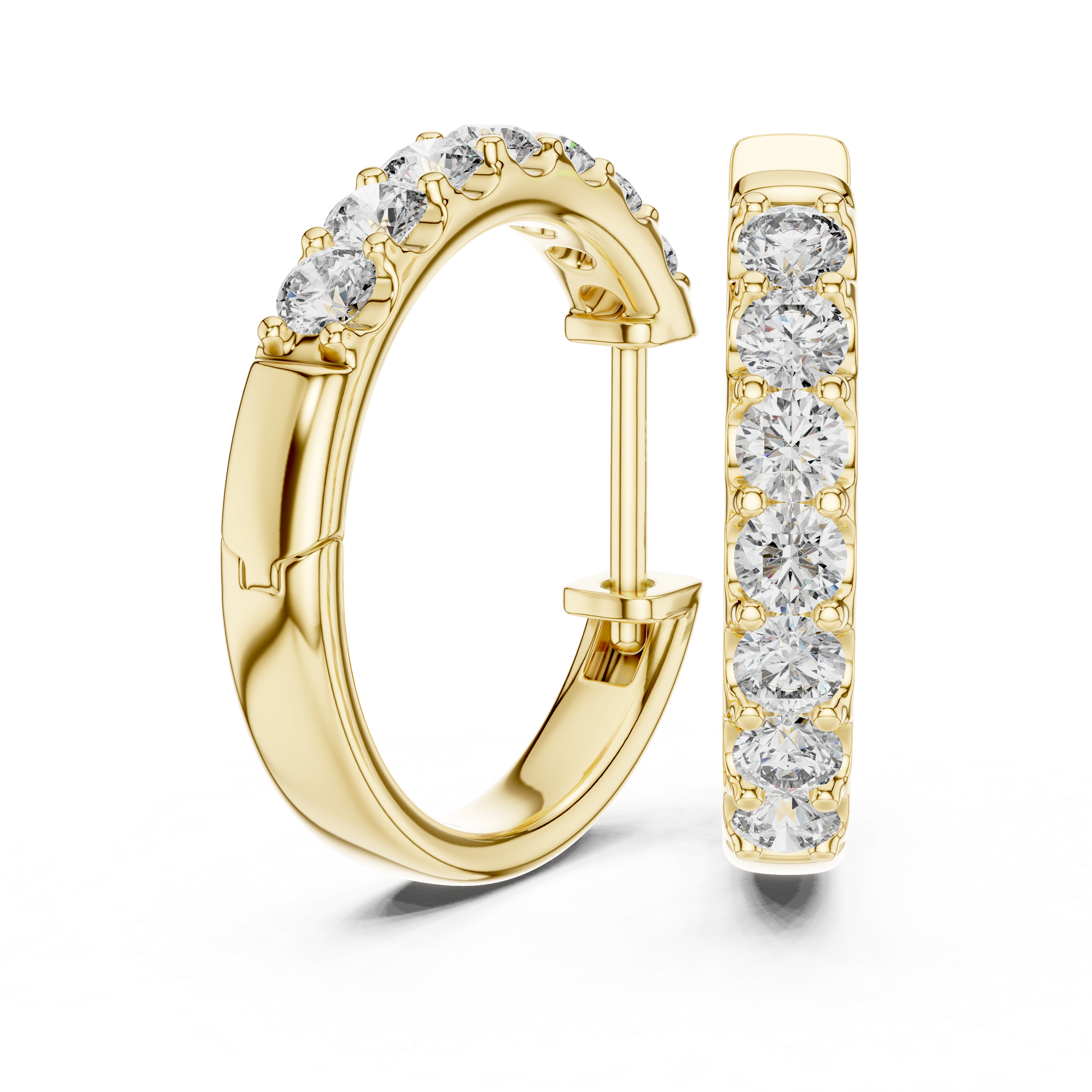 Roy Diamond yellow gold huggie hoop earrings close front angle with sparkling round diamonds on the outer edge