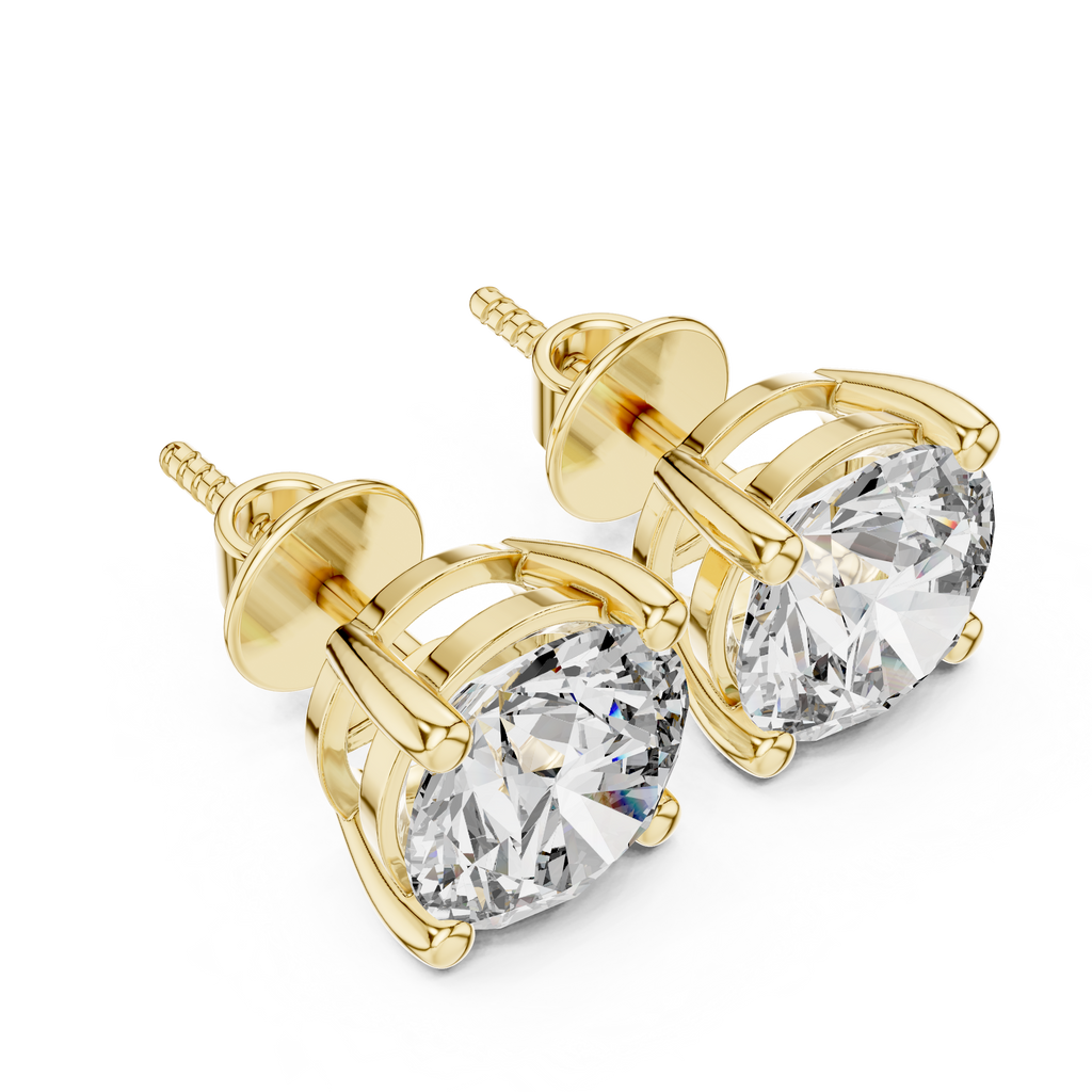 Gold stud earrings with clear gemstones on a white background