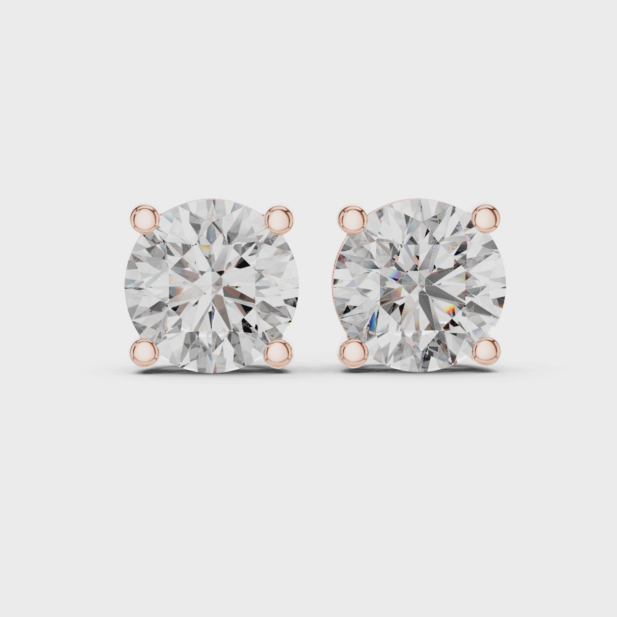 360 rotating video of Roy Diamond rose gold solitaire diamond studs 8.00 mm round brilliant 4.00 CT TW
