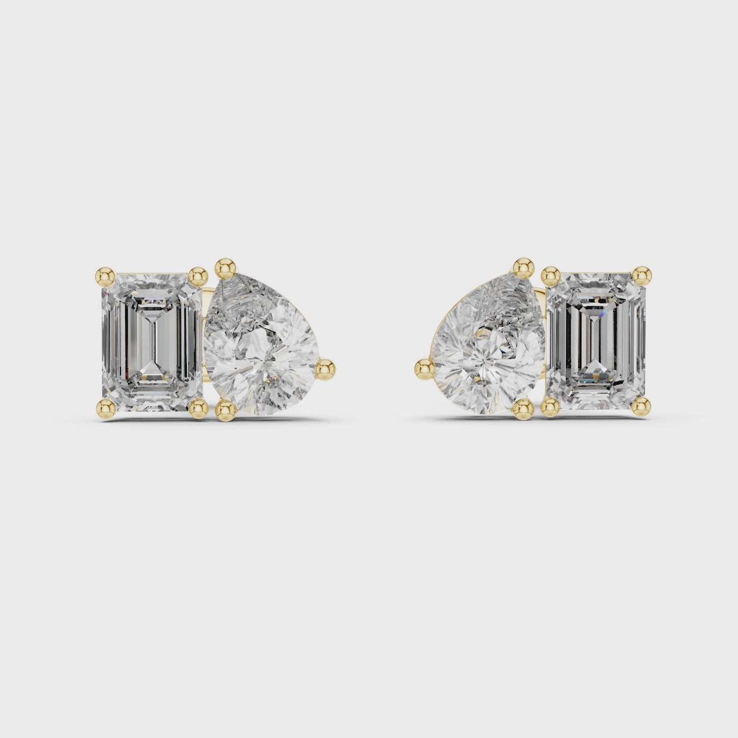 Pear & Emerald Cut Diamond Stud Earrings