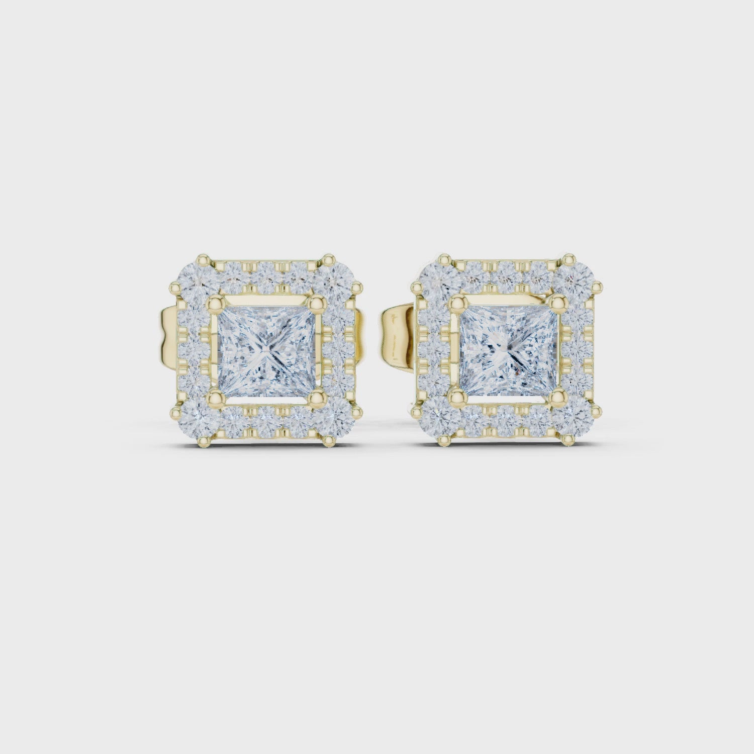 Roy Diamond princess cut lab grown diamond halo earrings angled view in yellow gold with royal elegance and brilliance